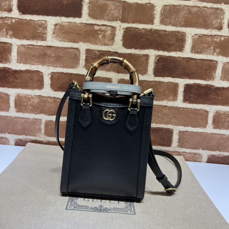 G*u*i top handle bags